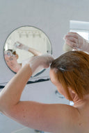 a person washing the hands