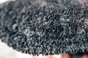 a close up of a pile of black hair