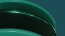 a close up of a green object with a black background
